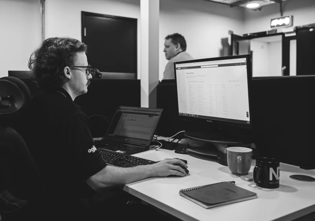 Scott Redpath working at his desk in the Net-Defence office.